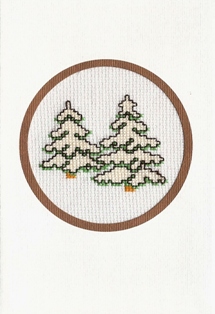 Dennebomen in de sneeuw